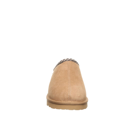 Tan suede slipper with stitched seam, rounded toe, and patterned cuff, shown from the back
