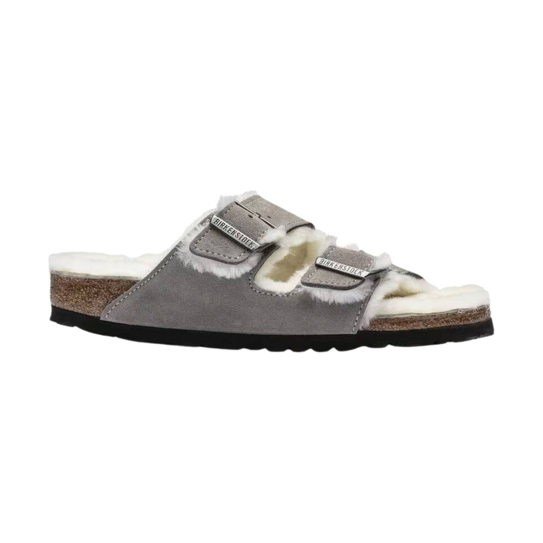 Gray suede shearling-lined slide sandal with two buckled straps and cork footbed