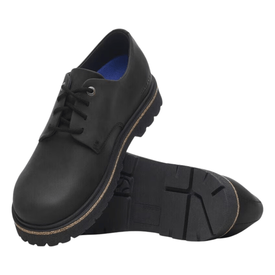 Black lace-up low-top shoe with thick lug soles