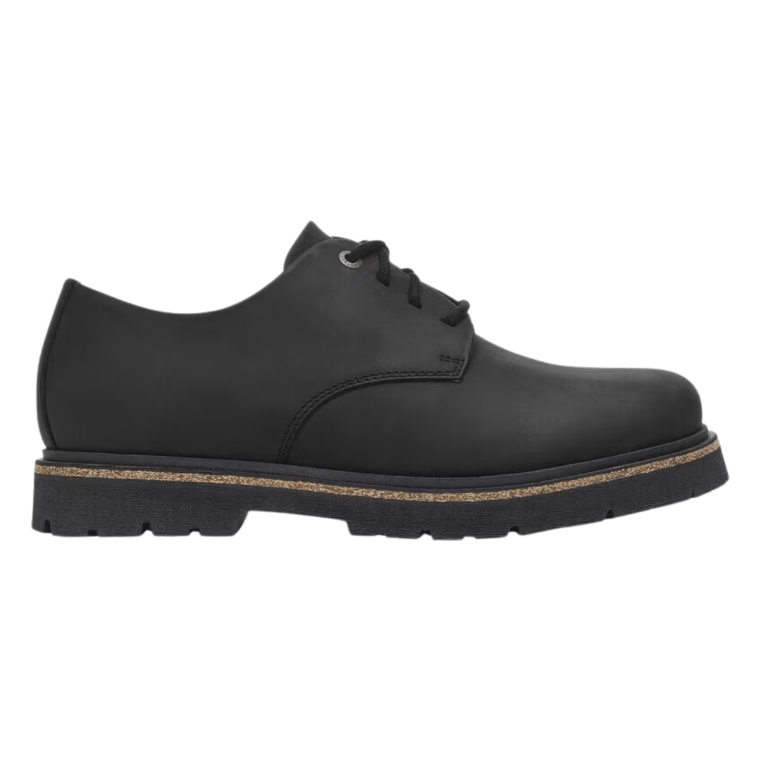 Black low-cut lace-up oxford shoe with thick lug sole