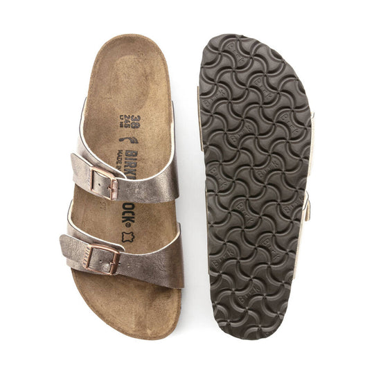 Taupe two-strap sandal shown from top and sole, with buckles and a textured dark outsole