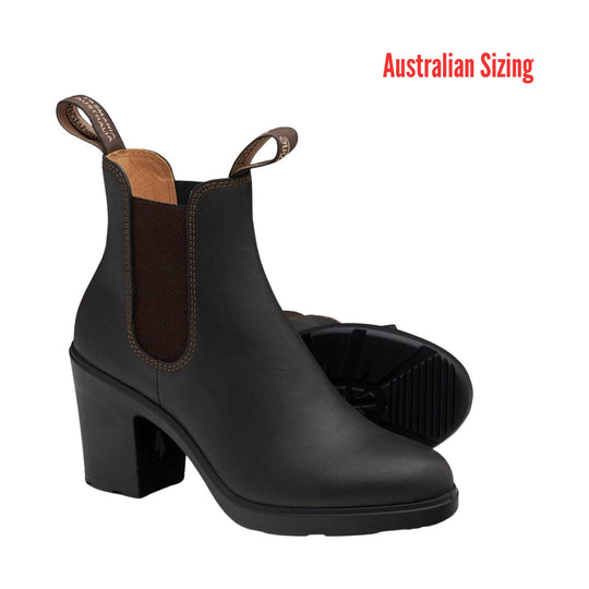 Black heeled ankle boot with elastic side panels and pull tabs