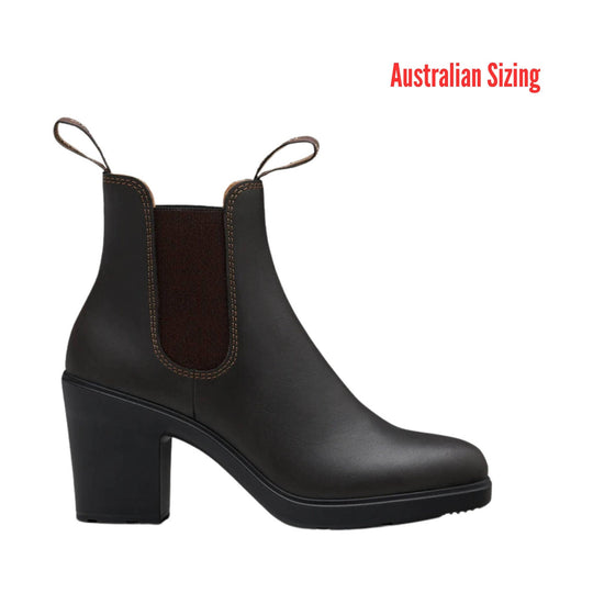 Black heeled Chelsea boot with side elastic panels and pull tabs