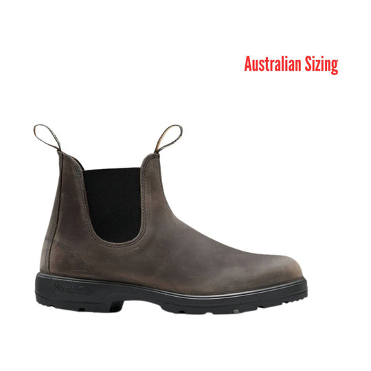 Brown Chelsea boot with black sole and pull tabs, shown in side profile