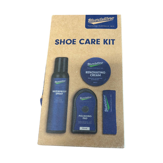 Brown boot care kit with a brush, cloth, and polish tin