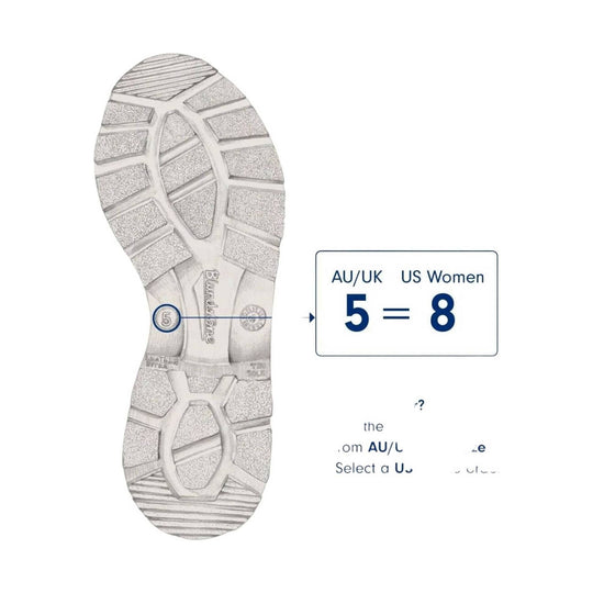 Shoe sole with size conversion chart from AU/UK to US Women's sizes on a white background