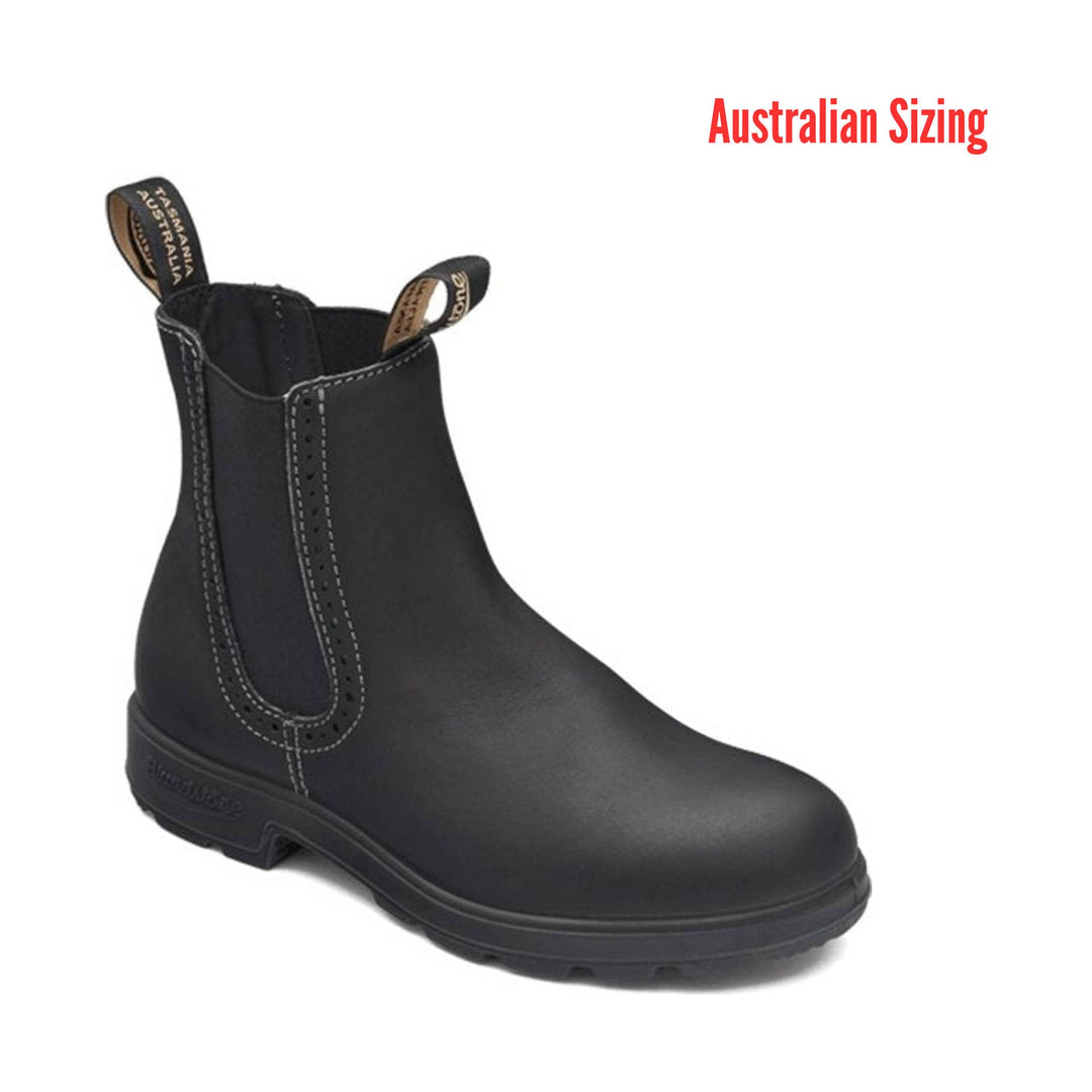 Black Chelsea boot with pull tabs and contrast stitching, shown in side view.