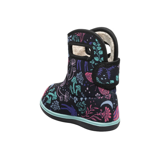 Black toddler rain boot with colorful floral and mushroom print and a hook-and-loop strap