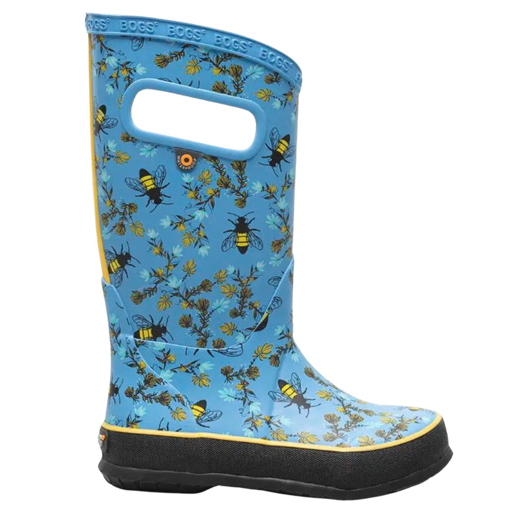 Blue knee-high rain boot with bee and floral print, black rubber sole, and top carry handle opening