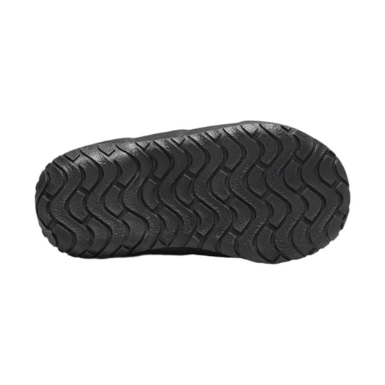 Black rubber boot outsole with wavy tread pattern
