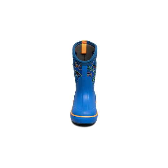 Blue kids' rubber boot seen from the back with monster truck print, orange pull tab, and thick sole