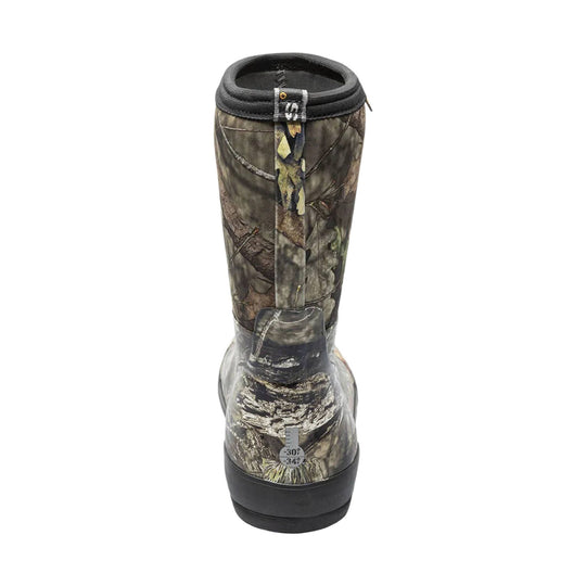 Mossy camouflage kids' rain boot with a tall shaft, black rubber lower, and temperature rating tag