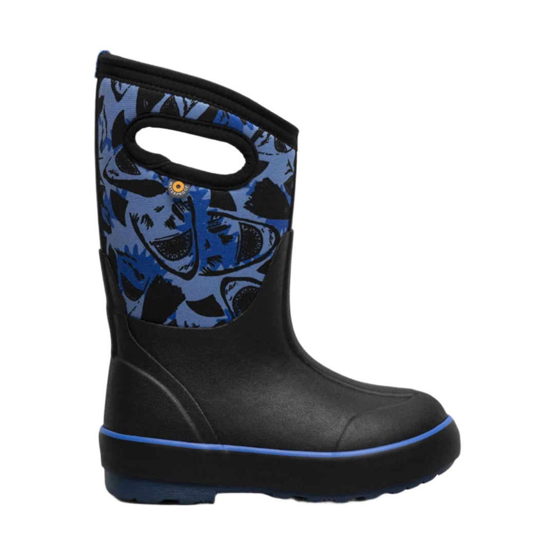 Black winter boot with blue shark-print shaft, oval pull handle, and blue trim
