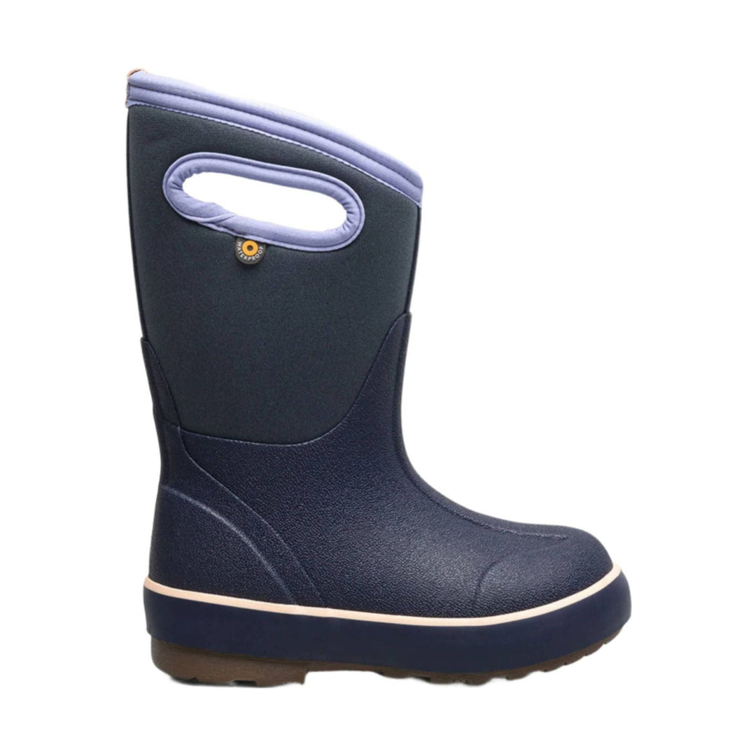 Tall navy winter boot with a lavender collar and oval side handle