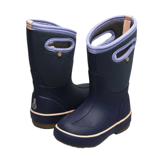 Pair of navy insulated winter boots with light lavender trim and pull-on handles