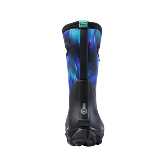 Black pull-on winter boot with blue iridescent shaft, front pull tab, and molded tread sole