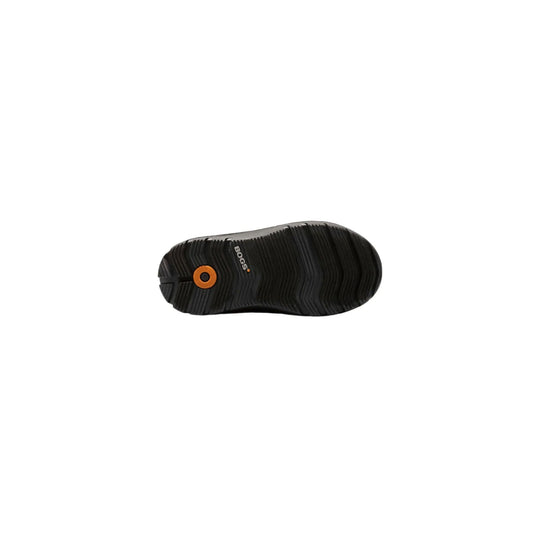 Black winter boot outsole with deep tread and orange BOGS logo plug