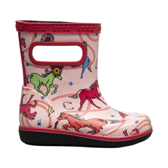 Pink rain boot with red trim and colorful horse print, shown in side view