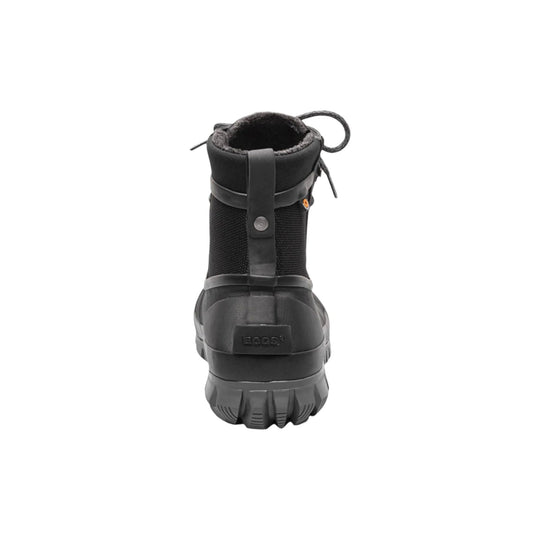 Black insulated winter boot shown from the back with thick lugged sole and pull loop