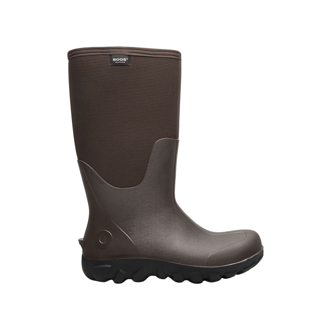 Brown tall waterproof rubber farm boot with black lug sole and top seam label