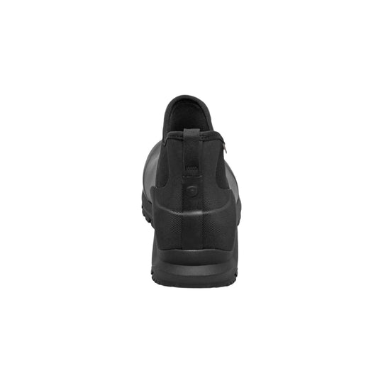 Black ankle-height waterproof boot seen from the back with a pull tab and textured upper