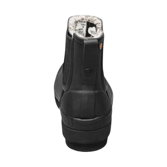Black ankle-height rain boot shown from the back with a thick treaded sole and patterned lining