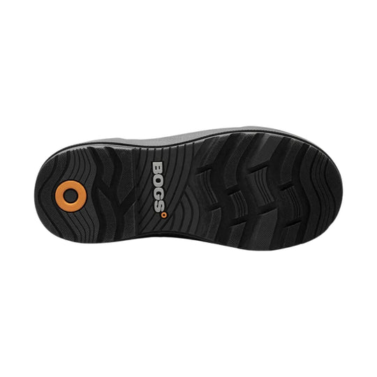 Black boot sole with orange circular traction detail and BOGS logo