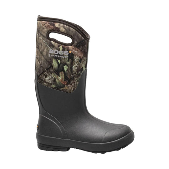 Tall black waterproof rain boot with mossy camouflage upper and pull handle