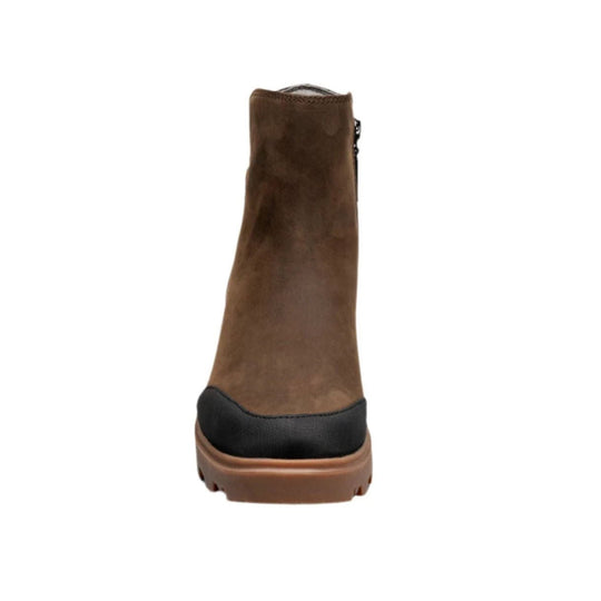 Brown suede ankle boot with black heel panel and lug sole, rear view