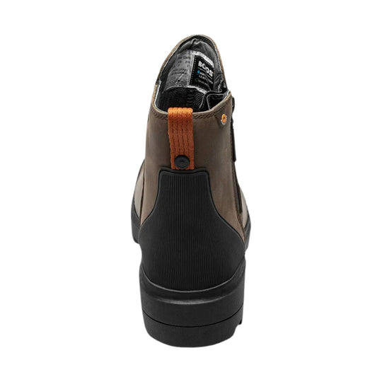 Brown ankle boot with black rubber heel and sole, back pull tab, and side zipper