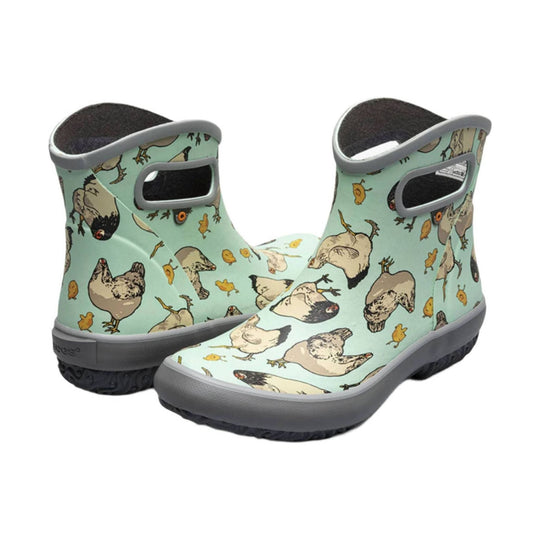 Mint green ankle rain boots with gray soles and chicken-and-chick print