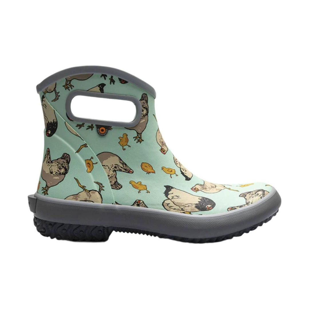 Mint-green ankle rain boot with chicken print, gray trim, and black treaded sole