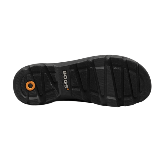 Black boot outsole with deep tread and orange circular insert