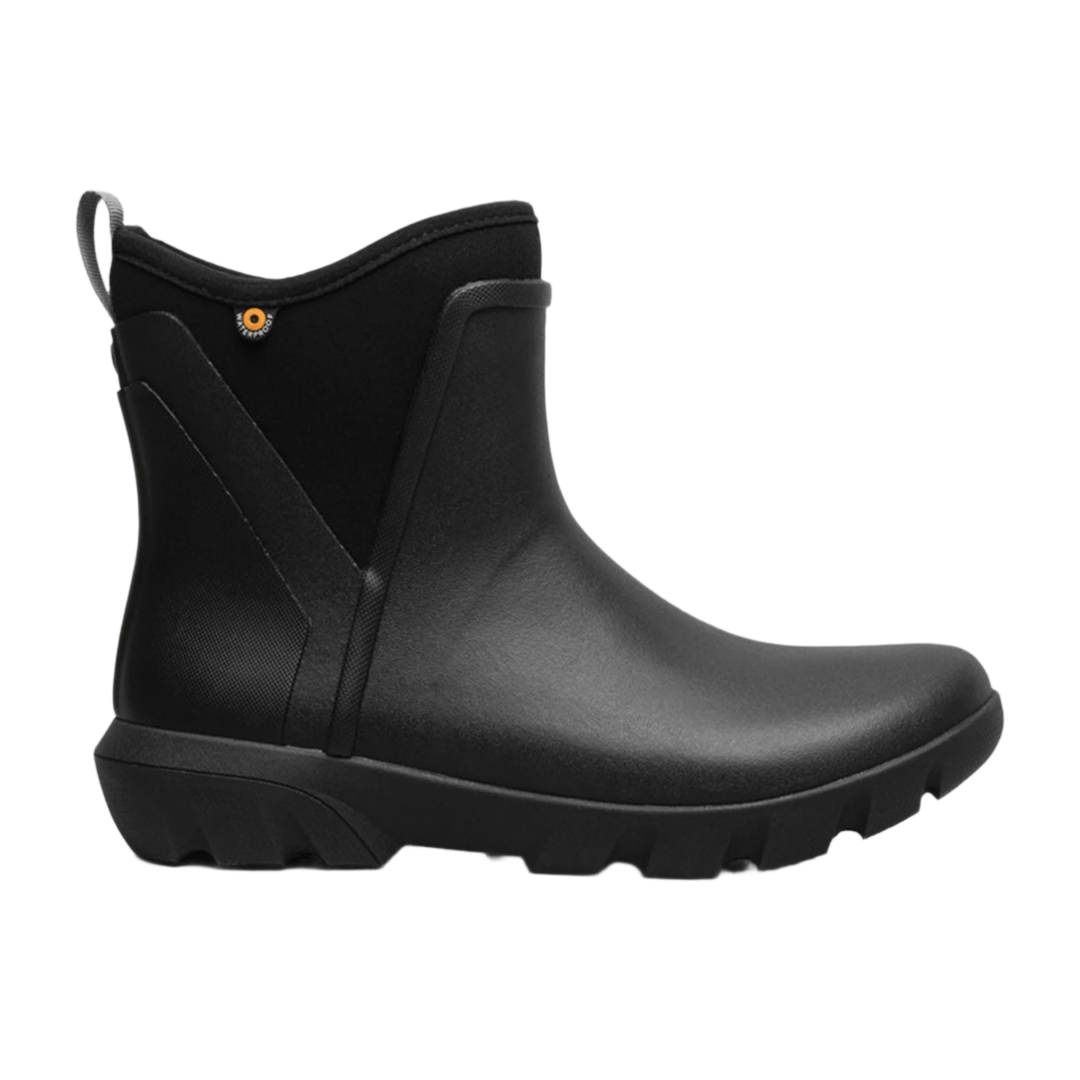 Black Chelsea-style rubber boot with a pull loop, side stretch panels, and lugged sole