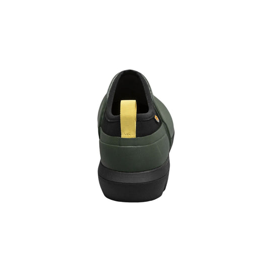 Dark green slip-on boot with black sole and yellow heel pull tab, rear view