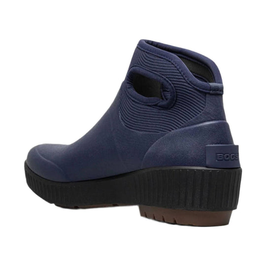 Navy ankle rain boot with ribbed neoprene upper, thick black sole, and brown tread