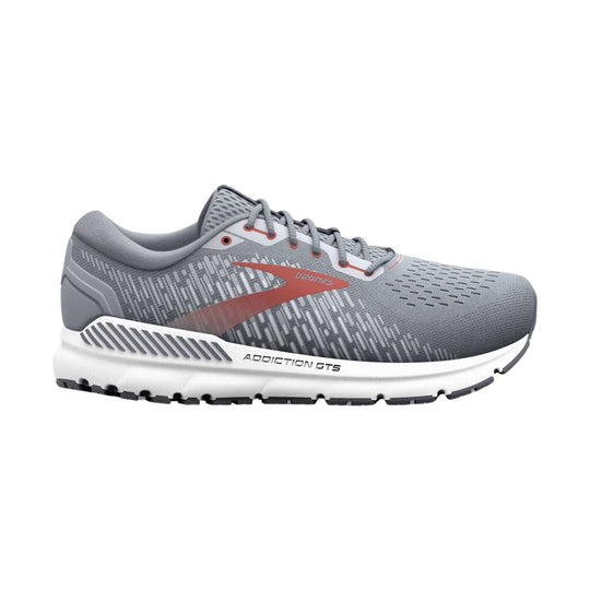 Gray mesh running shoes with white midsoles, black outsoles, and red accents