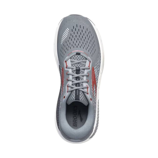 Gray running shoe with red accents, shown from above