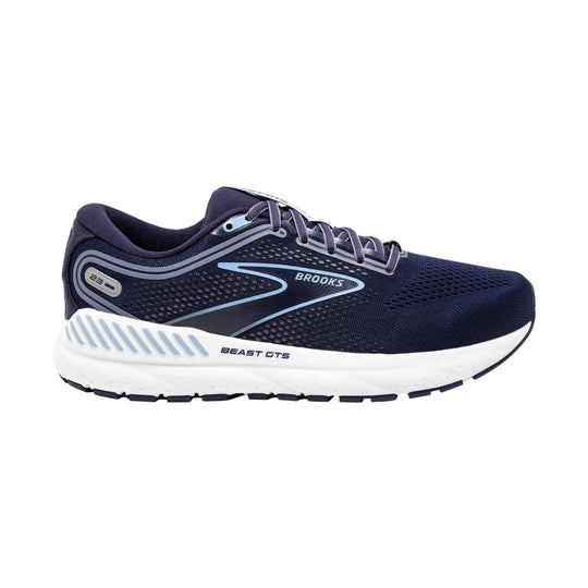 Navy running shoe with white cushioned sole and light blue accents, side view