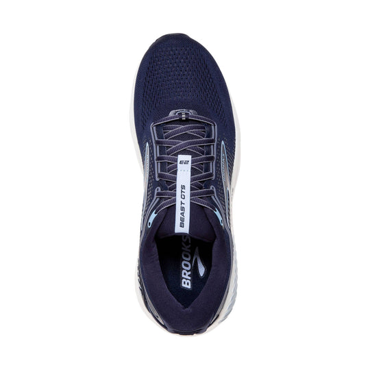 Navy running shoe seen from above with laces, knit upper, and Brooks branding