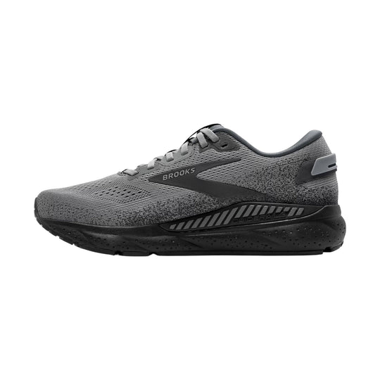 Gray and black Brooks running shoe in side view with knit upper and cushioned sole