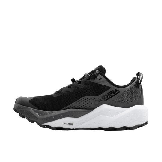Black and gray trail running shoe with a white cushioned midsole and lugged outsole