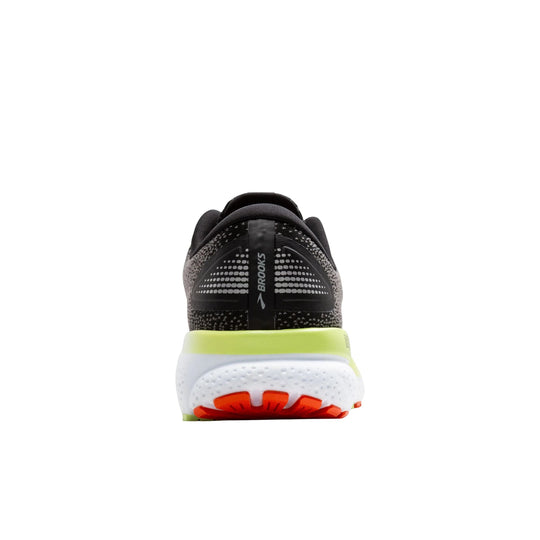 Rear view of a black running shoe with a white midsole, lime collar trim, and orange outsole accents