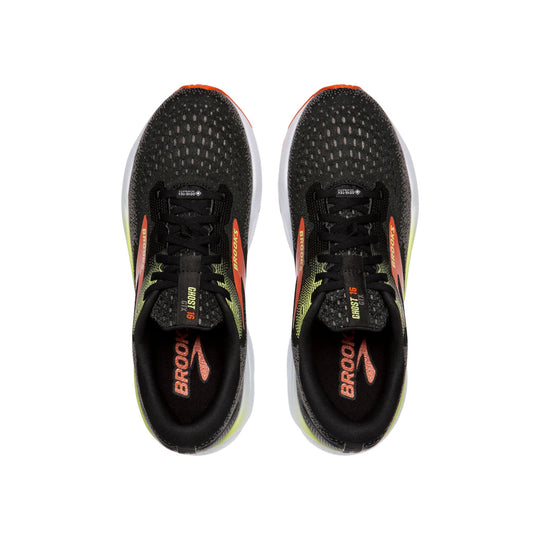 Black running shoes with orange accents, shown from above
