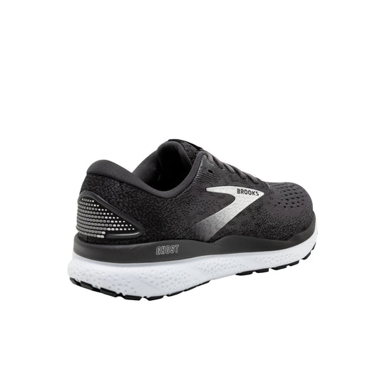 Black running shoe with white cushioned sole and side logo, shown from the back/side.