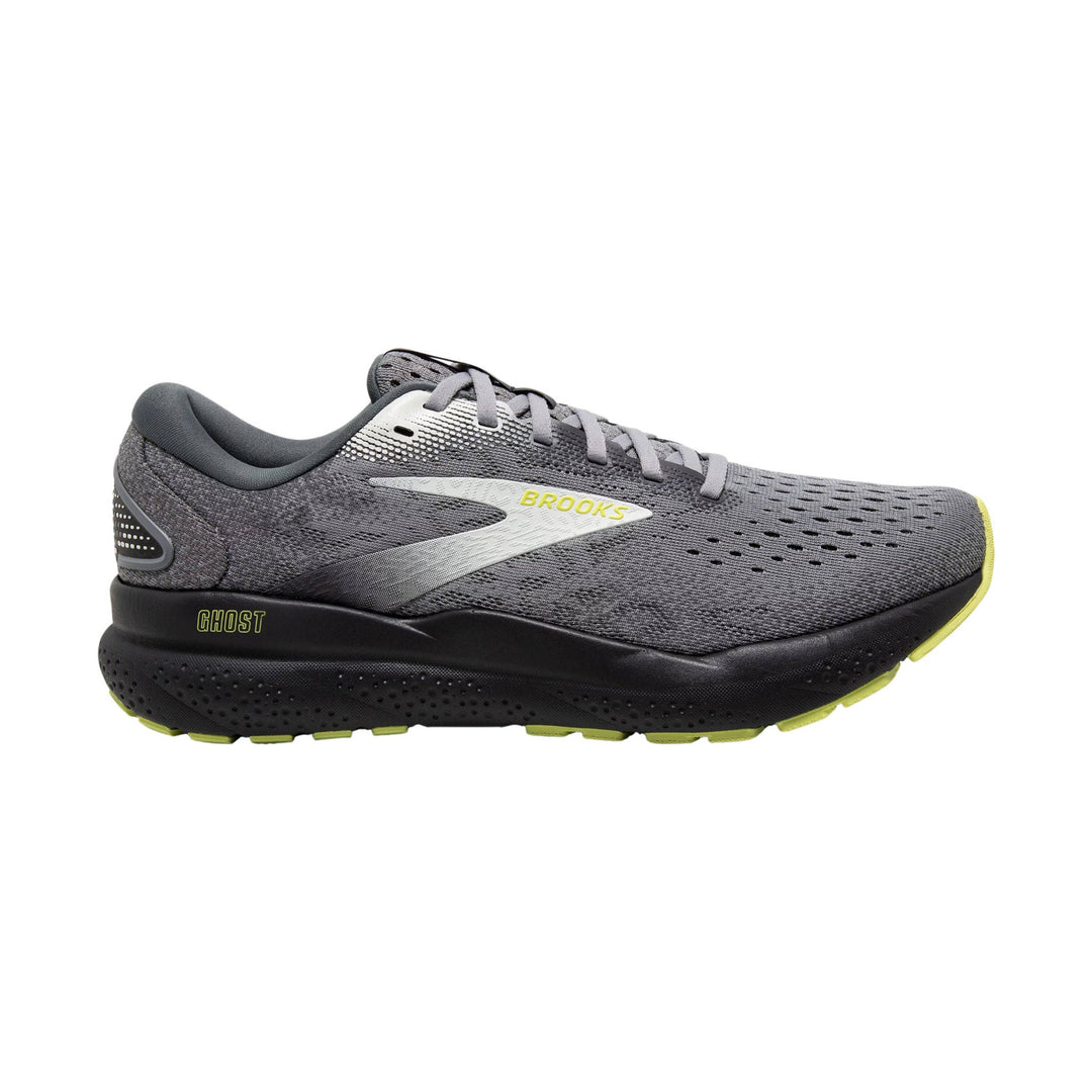 Gray and black running shoe with lime accents, side view
