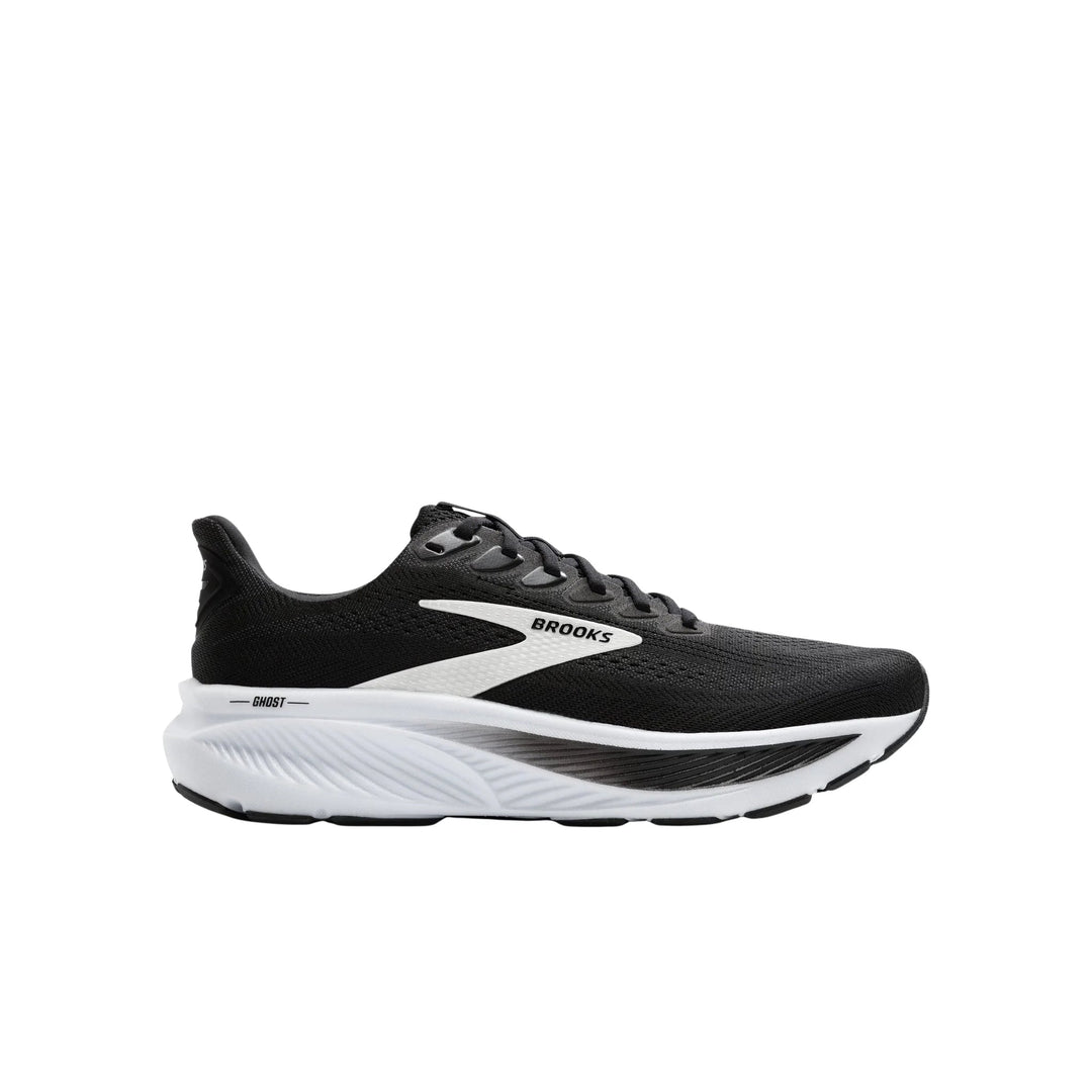 Black and white running shoe in side view with mesh upper, laced closure, and thick cushioned sole