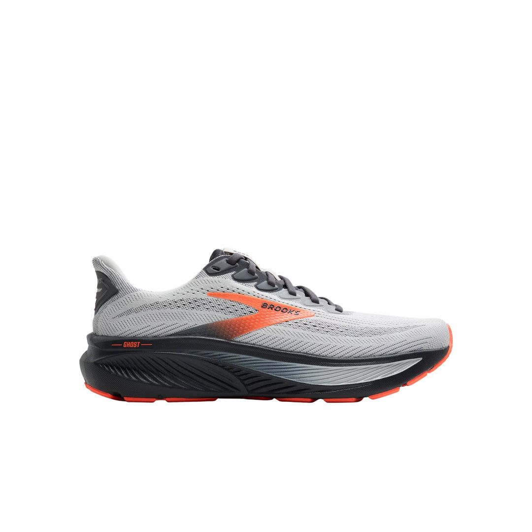 Gray running shoe with black sole and orange accents, side view
