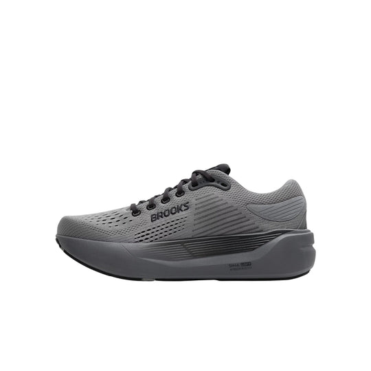 Gray running shoe with black laces and thick cushioned sole, side view