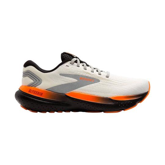 White running shoe with black and orange sole and gray side panel, shown in profile